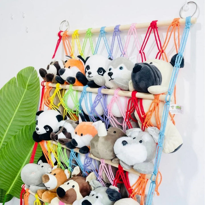 Space-saving toy hammock organizes kids' stuffed animals, decluttering playrooms & nurseries for a tidy room.