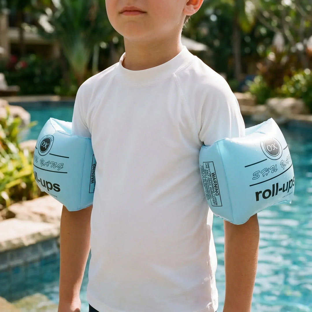Kids' inflatable arm floats for pool and beach fun, great swimming aids for children.