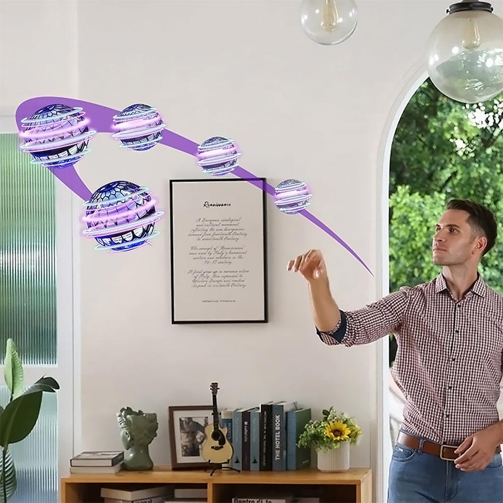 Kids' LED Boomerang Orb Flying Toy Sphere in action, glowing blue while spinning mid-air.