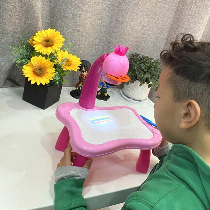 Fun kids' LED music projector for drawing! Encourages creative play & easy art tracing. Great educational toy.