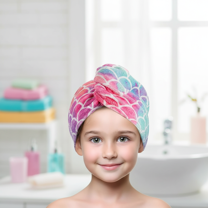Kids microfiber hair drying towel with playful scale design for quick and efficient drying after bath time.