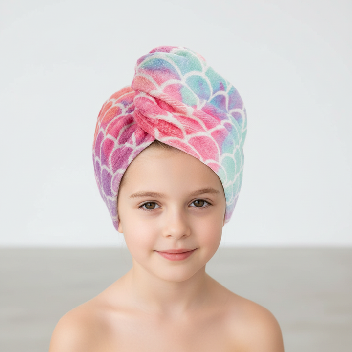 Quick-dry kids hair wrap in microfiber with an attractive scale design, reducing drying time for young ones.