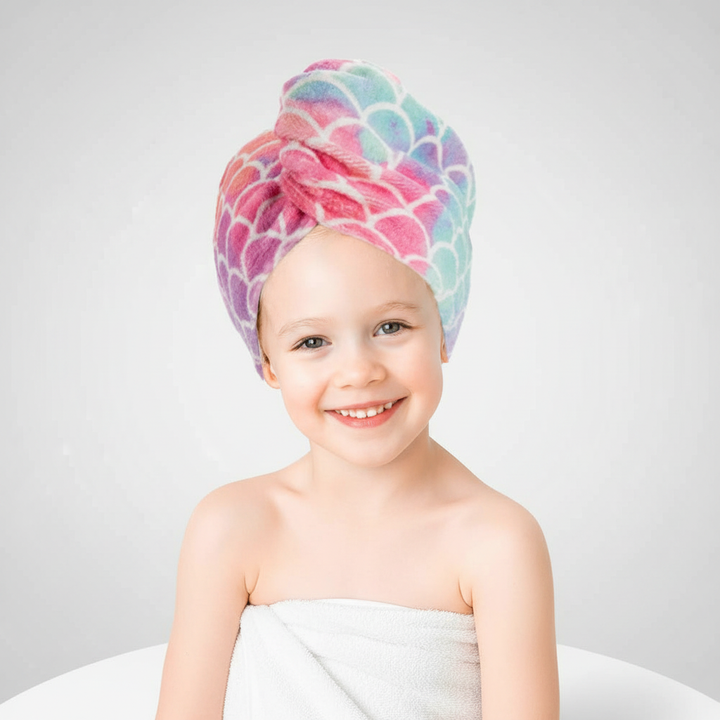 Close-up of a kids' microfiber hair drying towel, showcasing its soft texture and adorable scale pattern.