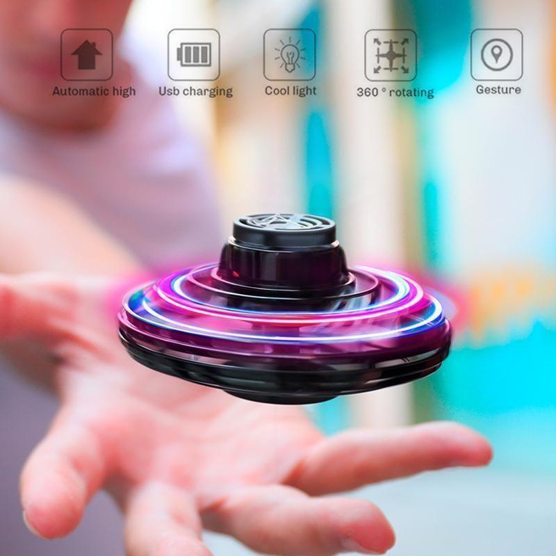 Kids' mini flying drone helicopter toy, interactive and rechargeable with LED lights.