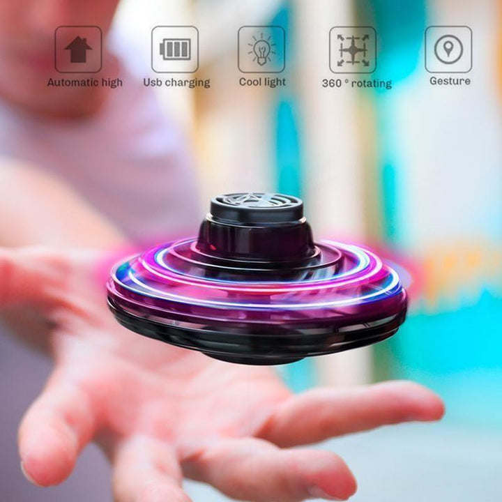 Kids' mini flying drone helicopter toy, interactive and rechargeable with LED lights.