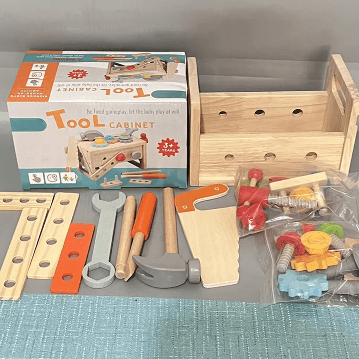 Kid actively playing with a Montessori wooden tool kit, developing motor skills, imagination, and learning.