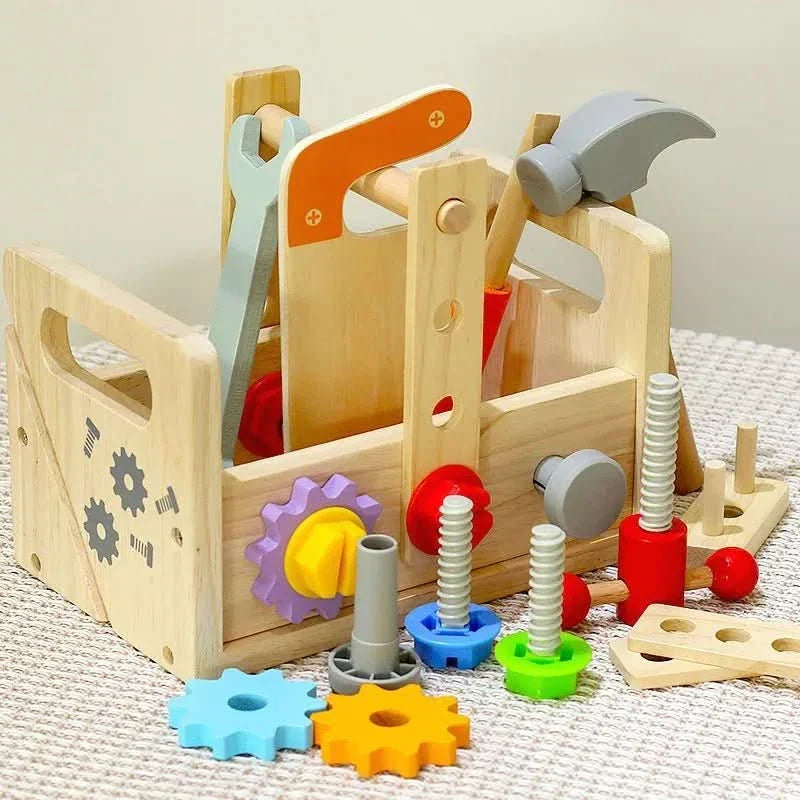 Toddler using wooden hammer & screwdriver from a Montessori tool kit, enhancing fine motor skills & pretend play.
