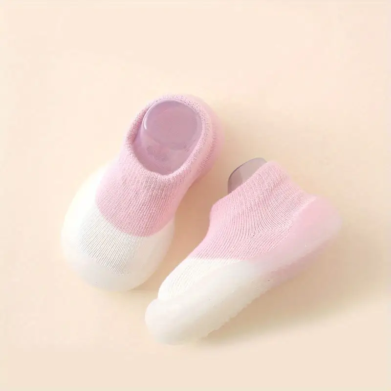 Close-up of Kids' NaturalStep barefoot walking shoes, showing flexible sole for natural movement.