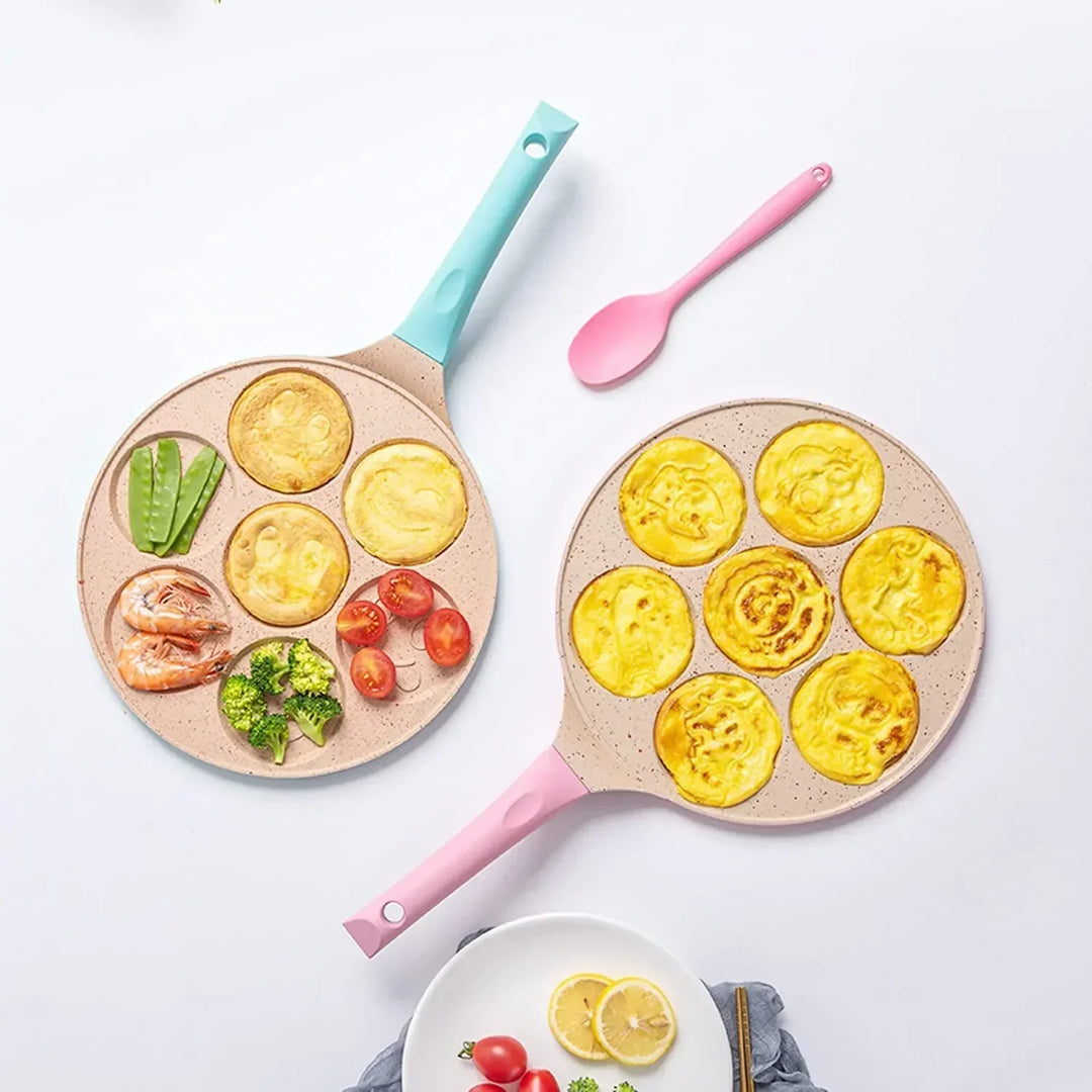 Kids' non-stick pancake pan with animal shapes. Enjoy easy breakfast cooking & fun family meals. Quick clean.