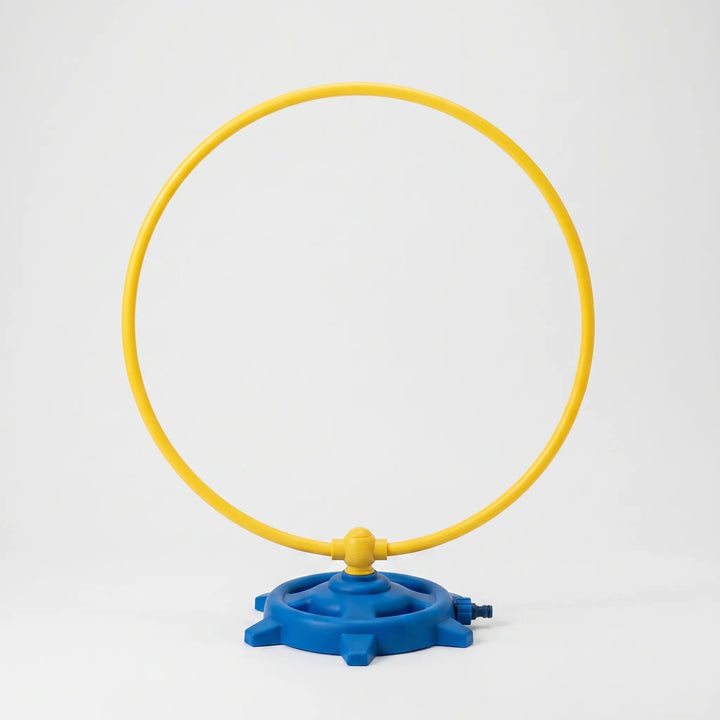 Colorful rotating water sprinkler for kids, ideal for outdoor summer playtime and refreshing water fun.