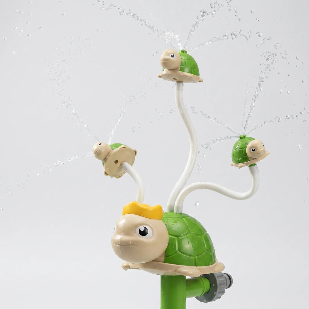Children's colorful rotating water play sprinkler creates a fun cool spray for active outdoor summer playtime.