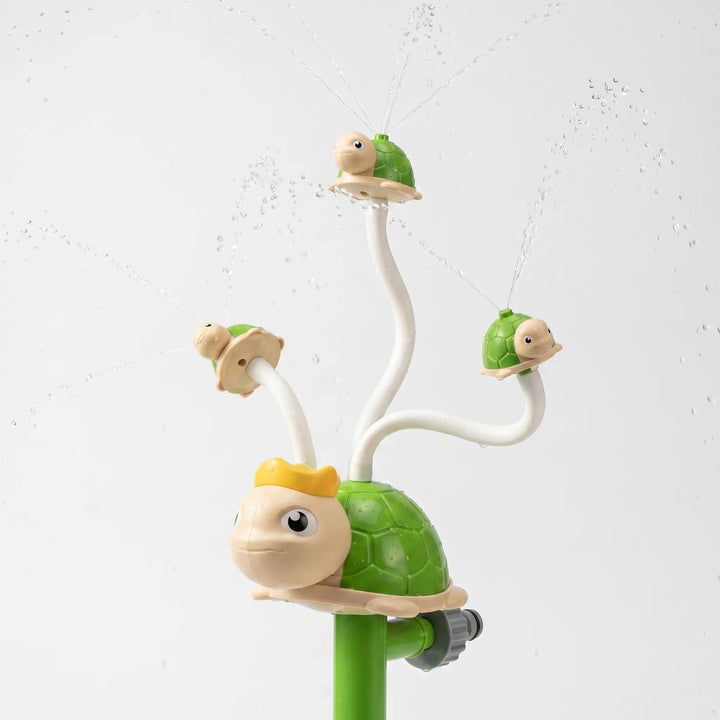 Children's active play sprinkler, a spinning water toy for exciting outdoor summer garden and lawn entertainment.