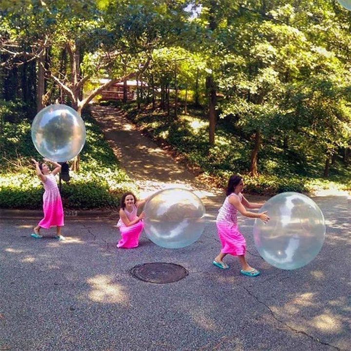 Outdoor fun with a tear-resistant inflatable bubble ball, great for kids' parties & games.