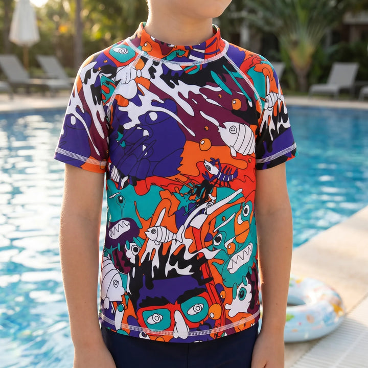 Kids' quick-dry short-sleeve rash guard, UPF 50+ for beach and pool play.