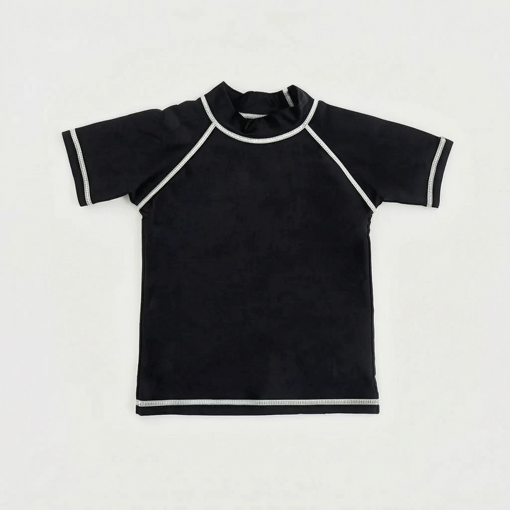 Youth quick-dry short-sleeve rash guard, ideal active swimwear for beach & pool fun. UPF 50+.