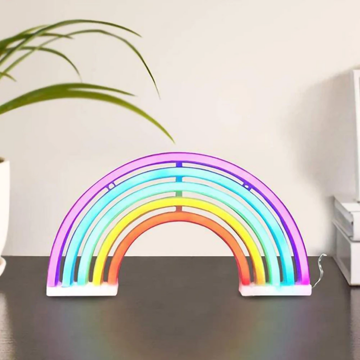 Soothing RadiantArc rainbow projector night light for a calming bedroom ambiance. Perfect LED gift for kids' rooms.