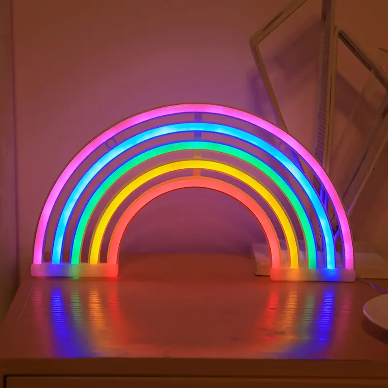 RadiantArc rainbow projector night lamp, a delightful gift for kids. Projects vibrant, colorful light for a soothing ambiance.