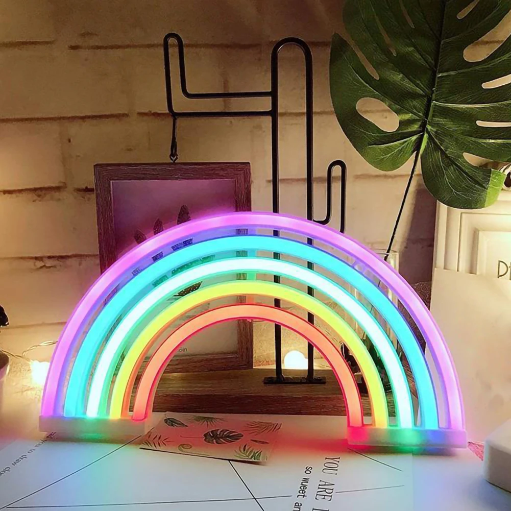 Colorful LED RadiantArc rainbow projector night light for a vibrant kids' room. Creates soothing bedroom ambiance.