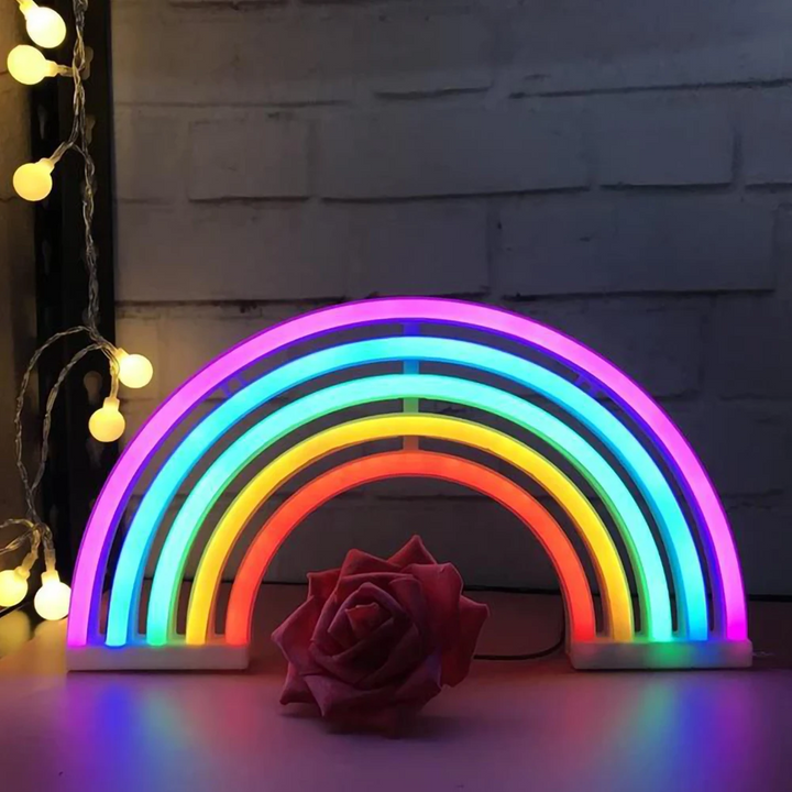 RadiantArc rainbow projector night light. Magical children's LED lamp creating a colorful, soothing bedroom ambiance.