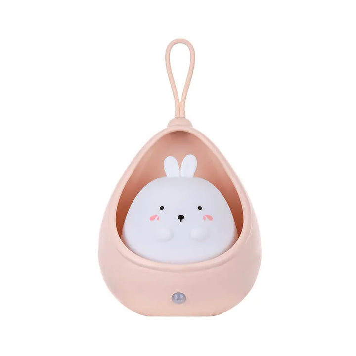 Kitten-themed rechargeable night light with motion sensor, safe LED for kids' room decor.