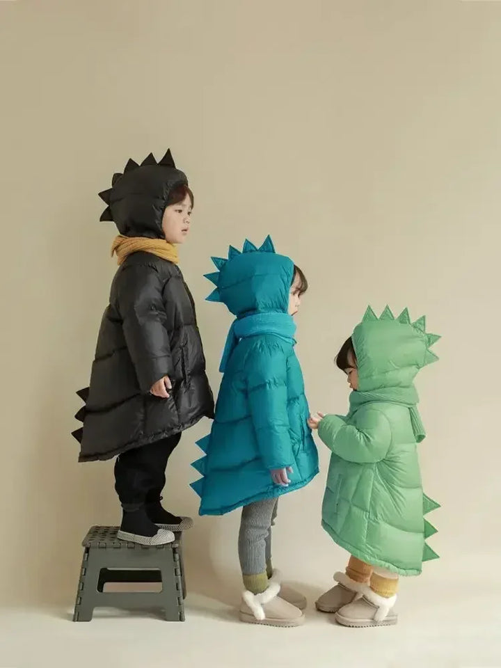 Kids' roaring dinosaur winter jacket, warm & waterproof, with fun dino spikes on hood & back. Perfect for boys & girls.