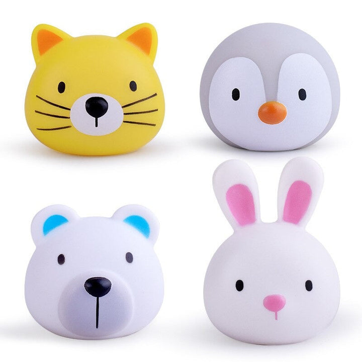 Assorted light-up kids' bath toys, like floating ducks & fish. Twinkling water toys make bath time playful.