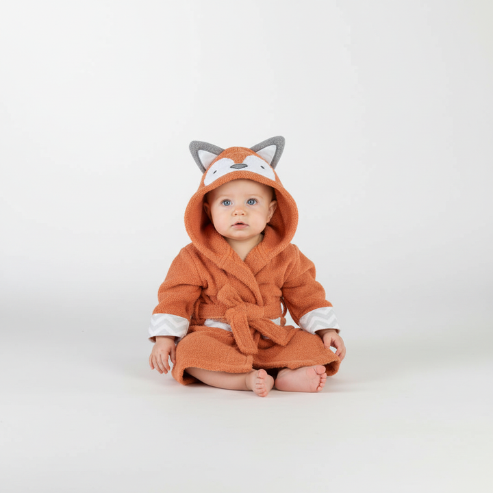 Folded animal motif hooded towel for kids, showcasing the high-quality cotton fabric and playful design