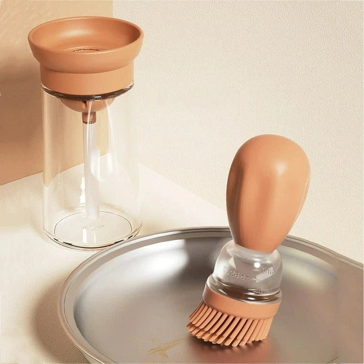 OilBuddy silicone oil bottle with brush for precise cooking, baking, and grilling oil dispensing.