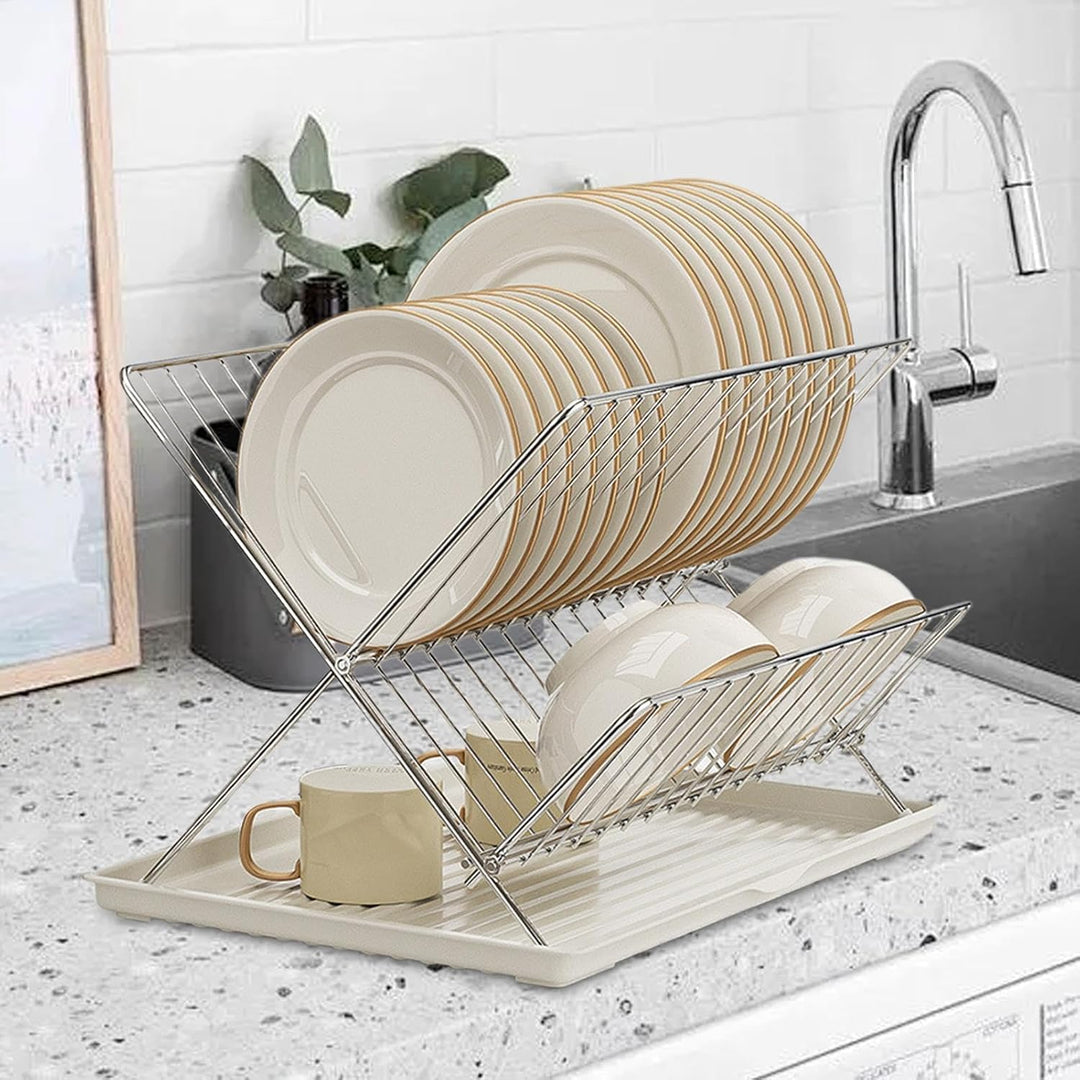 Klvra space-saving 2-tier dish drainer, folds flat for storage, includes a detachable tray for kitchen counters.