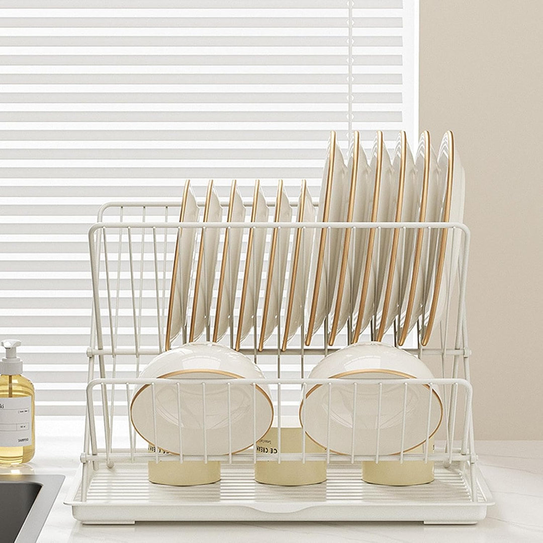 Foldable 2-tier dish rack by Klvra with a detachable tray, ideal for countertop drying in a small kitchen.