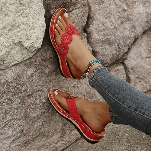 Comfortable ladies' summer sandals, floral accents, orthopedic design for arch support.