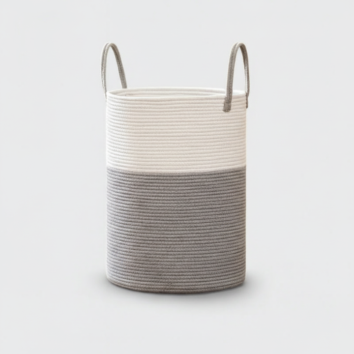 Minimalist large cotton rope basket with handles, great for nursery toy storage or living room decor.