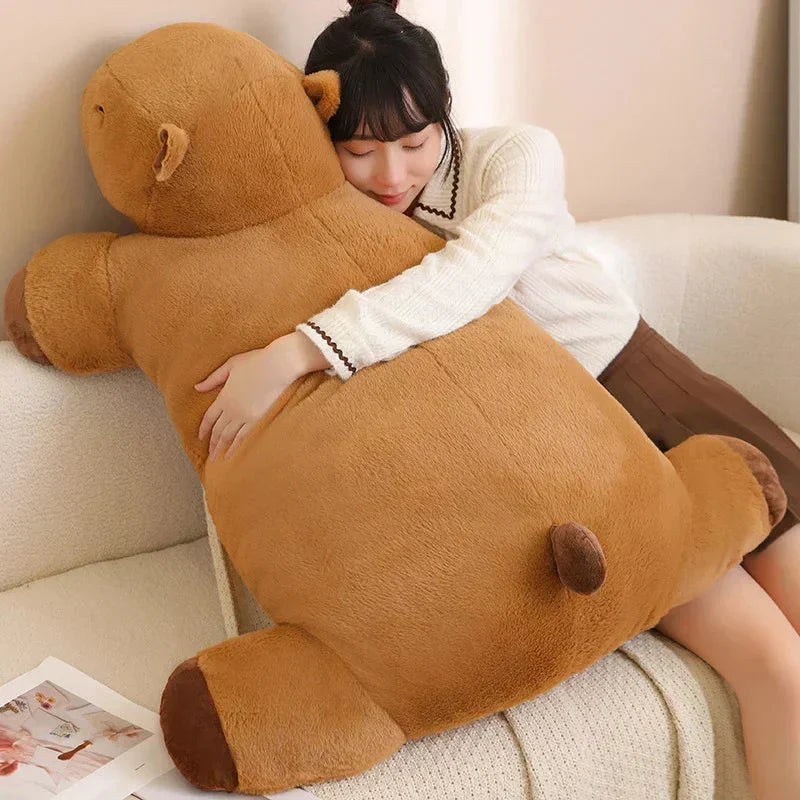 Cute oversized capybara plush, comfort pillow & soft toy for relaxation. Perfect gift.