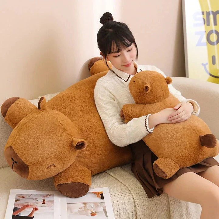 Unisex giant capybara plushie, a soft & lovable stuffed animal friend. Great for snuggling.
