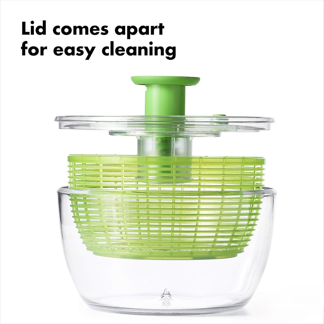 Close-up of the easy spin handle on a large salad spinner, a must-have kitchen tool.