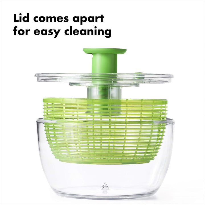 Close-up of the easy spin handle on a large salad spinner, a must-have kitchen tool.