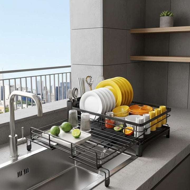 Spacious dish drainer for kitchen countertop, designed for drying various dishware, includes drip tray.