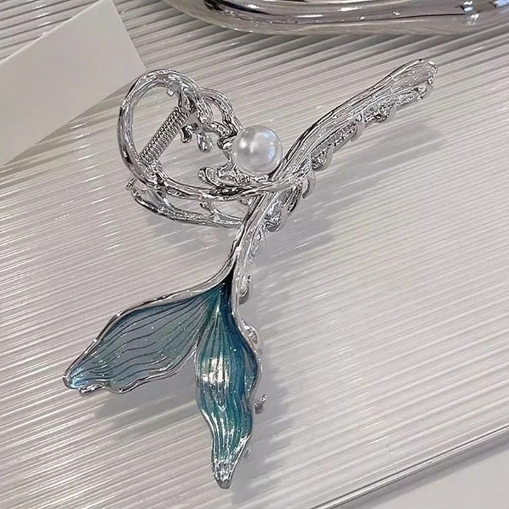 Women's large mermaid tail hair clip, featuring a shimmering design & delicate pearls. A unique hair accessory.