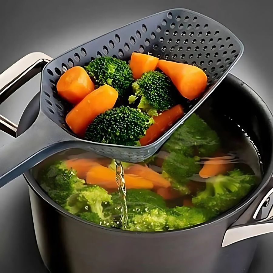 Large PP kitchen draining & serving spoon. Ideal cooking utensil for versatile food prep & easy serving.