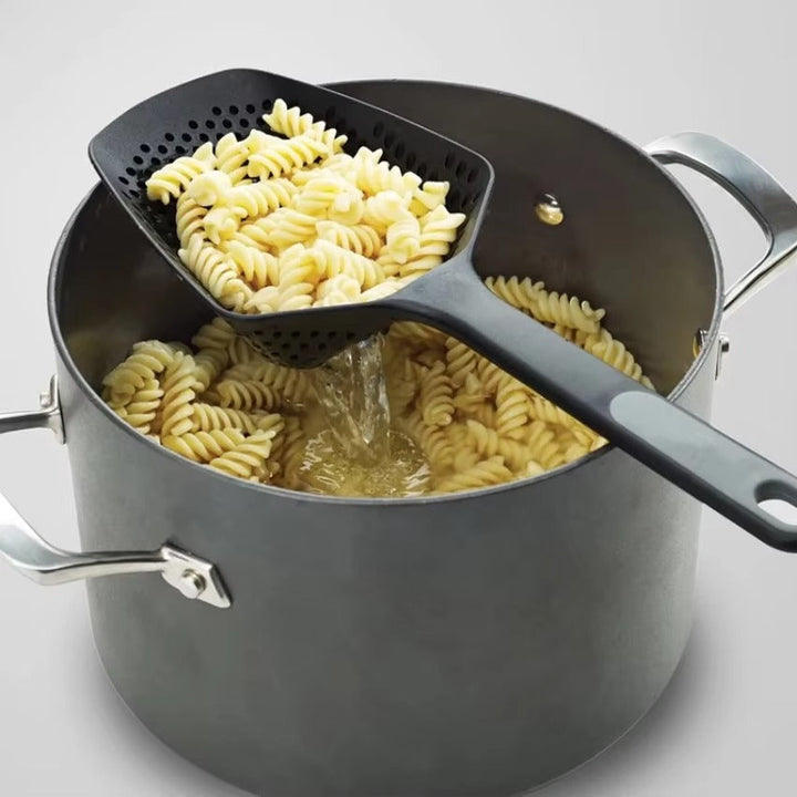Versatile large serving spoon with draining holes. Perfect kitchen utensil for serving stews, pasta & veggies.