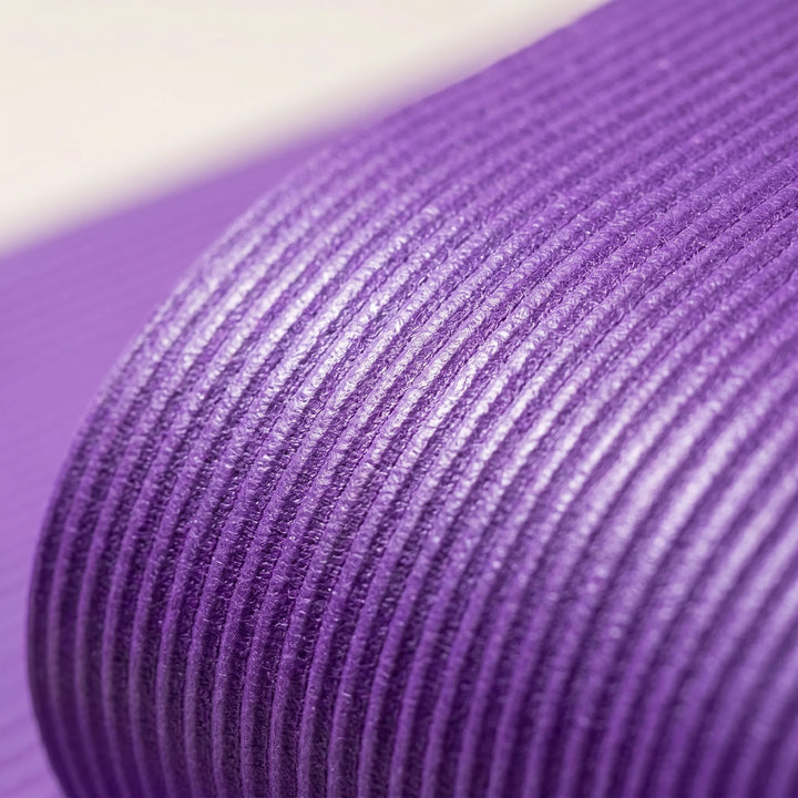 Thickened non-slip fitness mat for comfortable yoga, pilates, or general exercise routines. Large & durable.