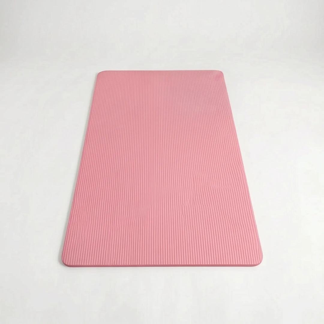 Unisex large, thick exercise mat with non-slip surface for yoga, pilates, and home fitness. Durable & comfortable.