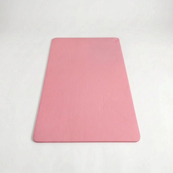 Unisex large, thick exercise mat with non-slip surface for yoga, pilates, and home fitness. Durable & comfortable.