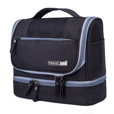 Unisex travel case for makeup & personal care. A large hanging toiletry organizer with various compartments.