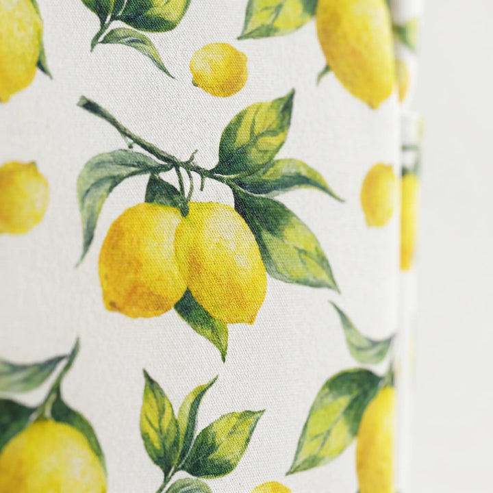 Spacious interior of a large women's beach tote bag with tropical lemon print, showing ample capacity for essentials.