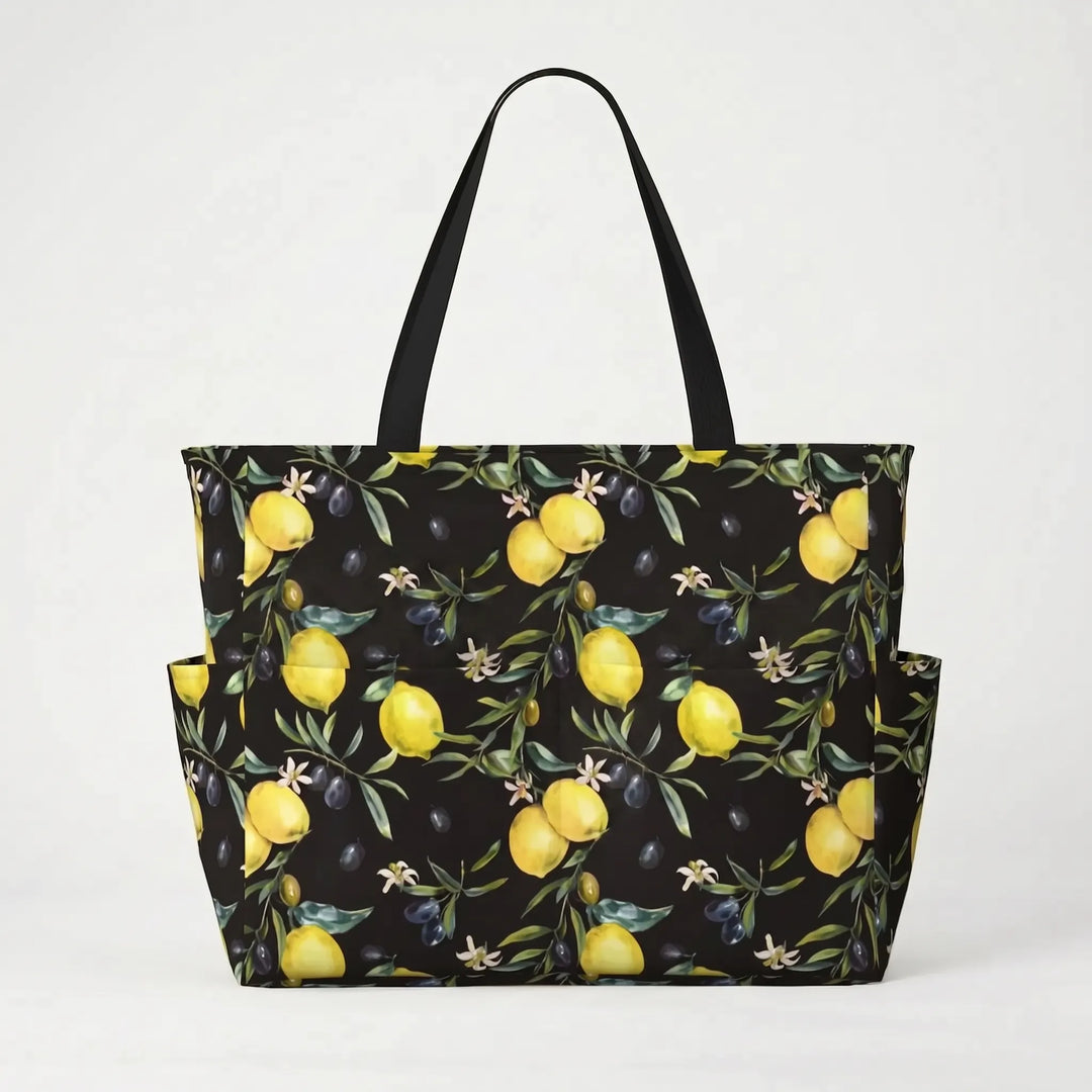 Front view of a large women's tropical lemon print beach tote bag with sturdy handles, ideal for carrying.