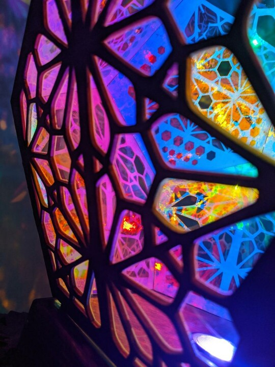 Modern LED table lamp with stained glass look, projects stars. Perfect for a cozy night light or decorative room lighting.