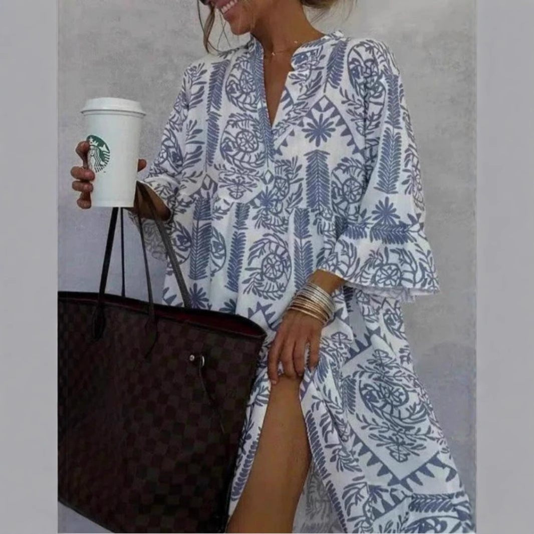 Women's boho floral tunic sundress with tiered skirt, a relaxed fit perfect for resort wear or casual summer days.