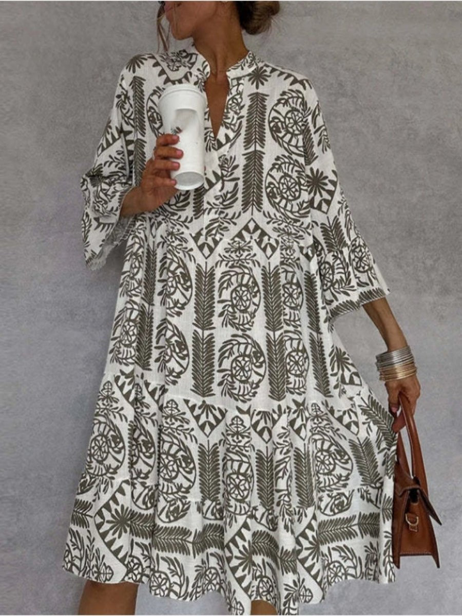 Relaxed fit floral sundress for women with a tiered skirt, embodying a comfortable boho tunic style for summer.