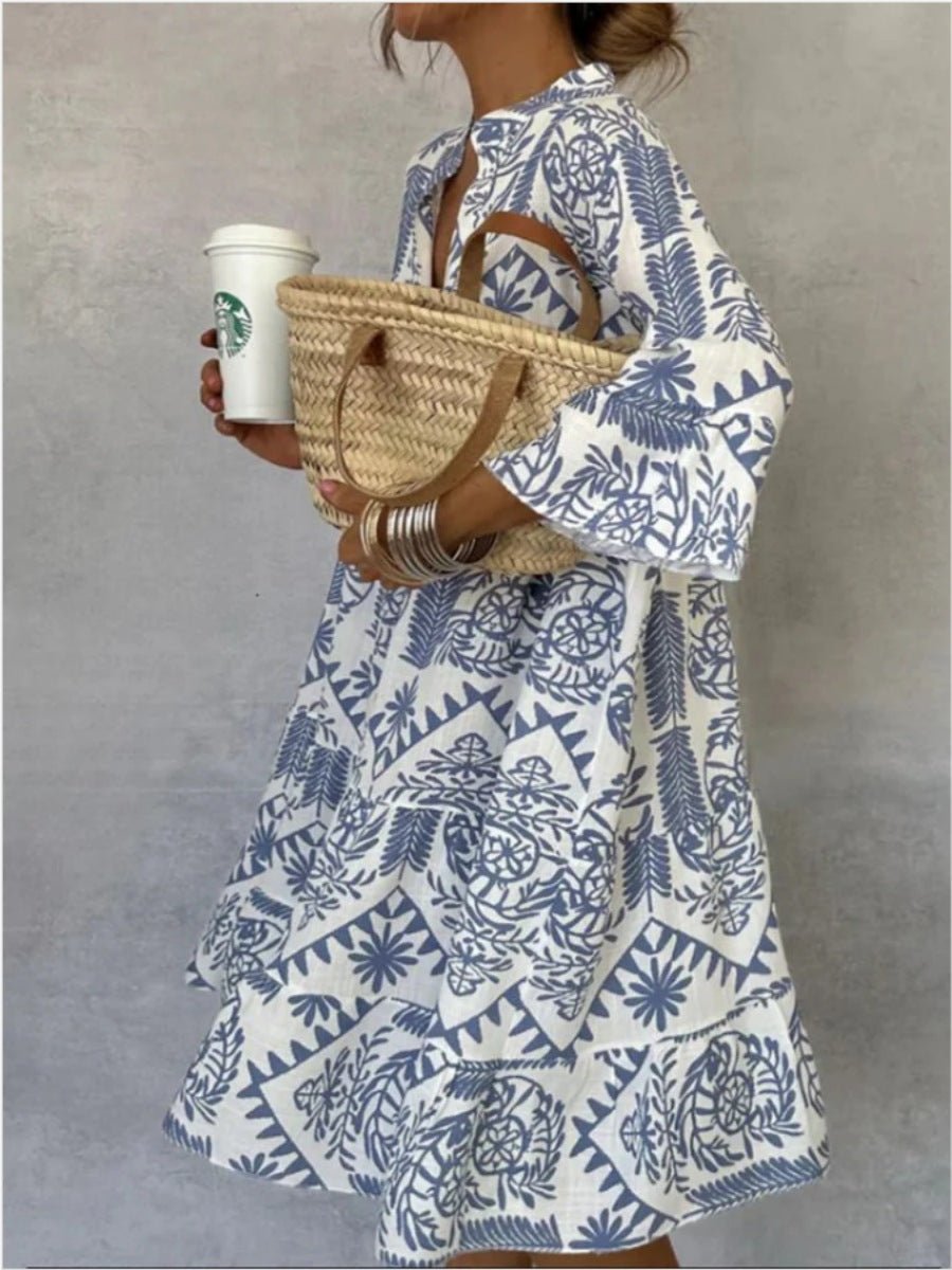 Boho floral sundress for women, tiered skirt tunic style. Perfect light blue summer dress for casual & resort wear.